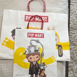 Pop Mart Character Design Bags set of two. One Small and one Large.